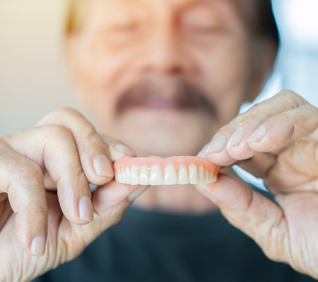 Chester Adjusting to New Dentures